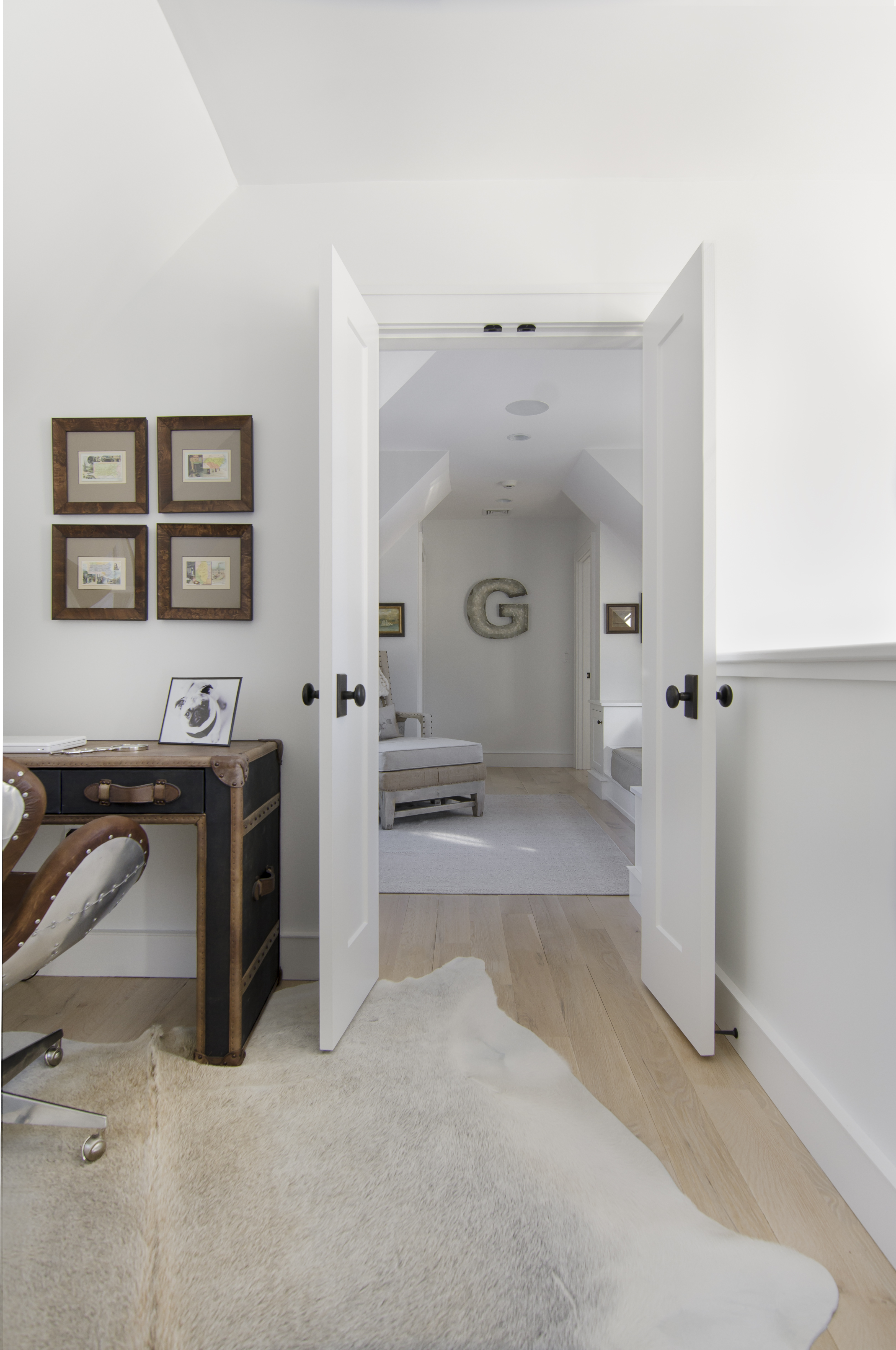 white hallway with hyde rug