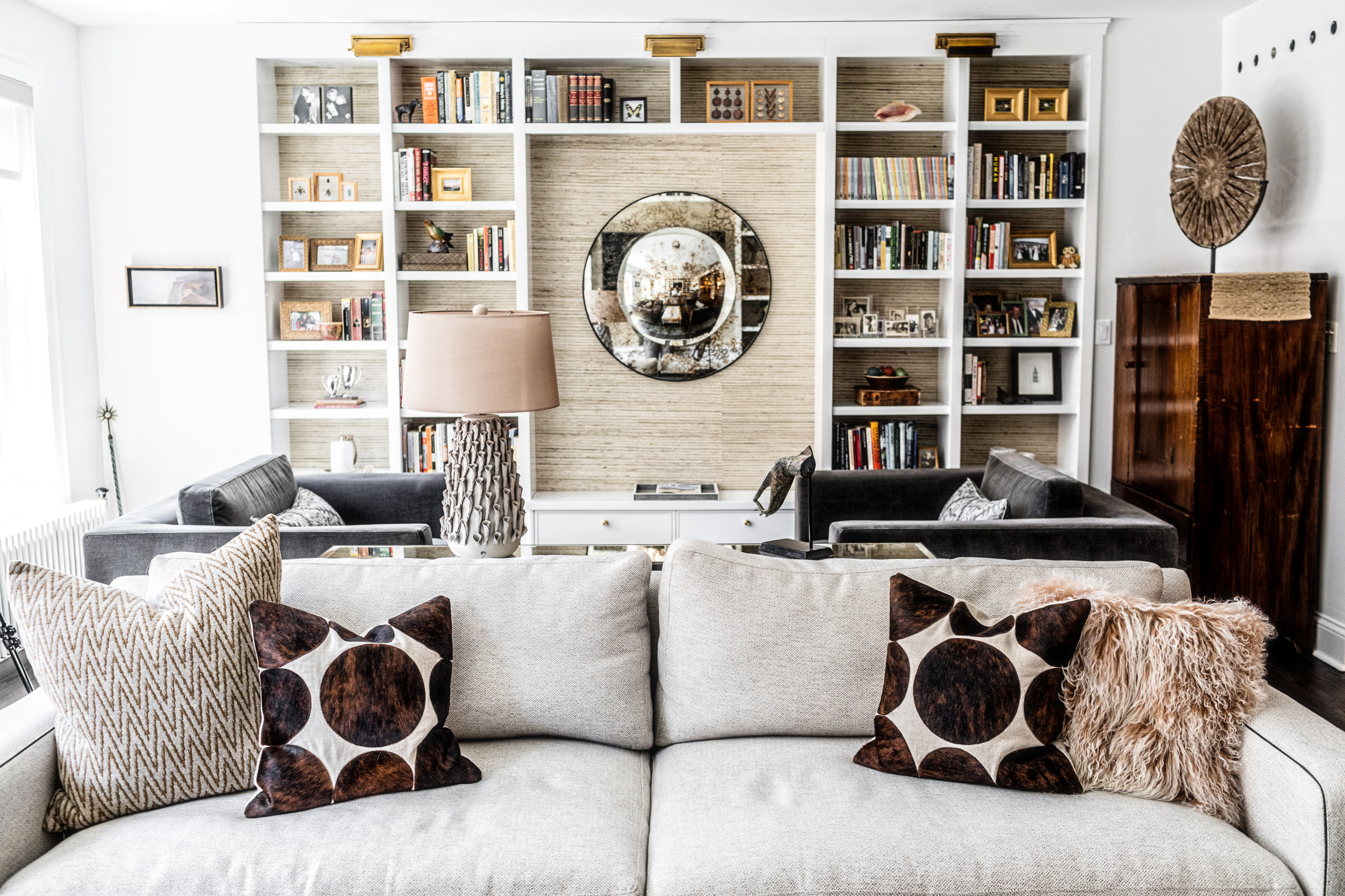 white couch with textured pillows