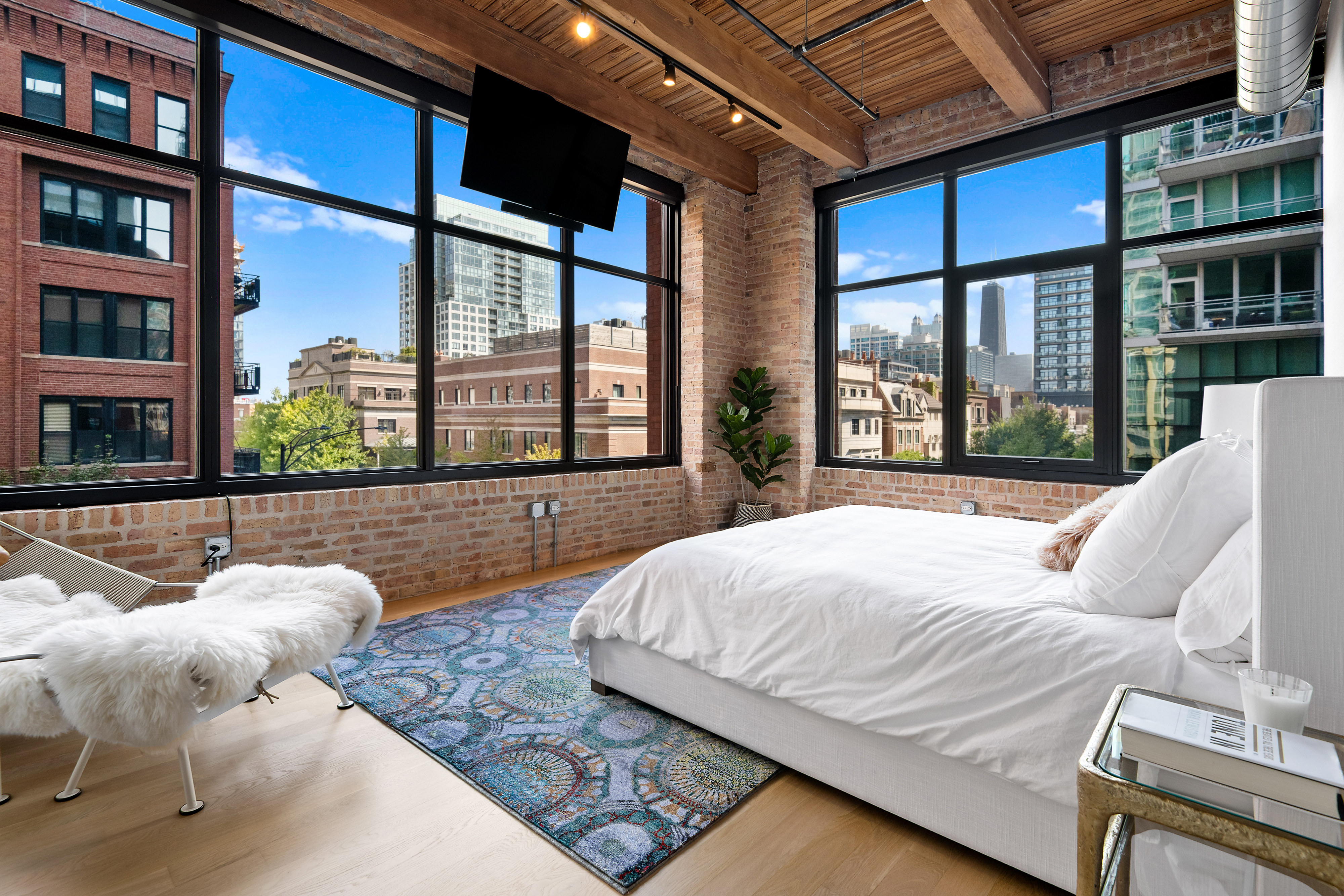 bedroom looking out to city skyline