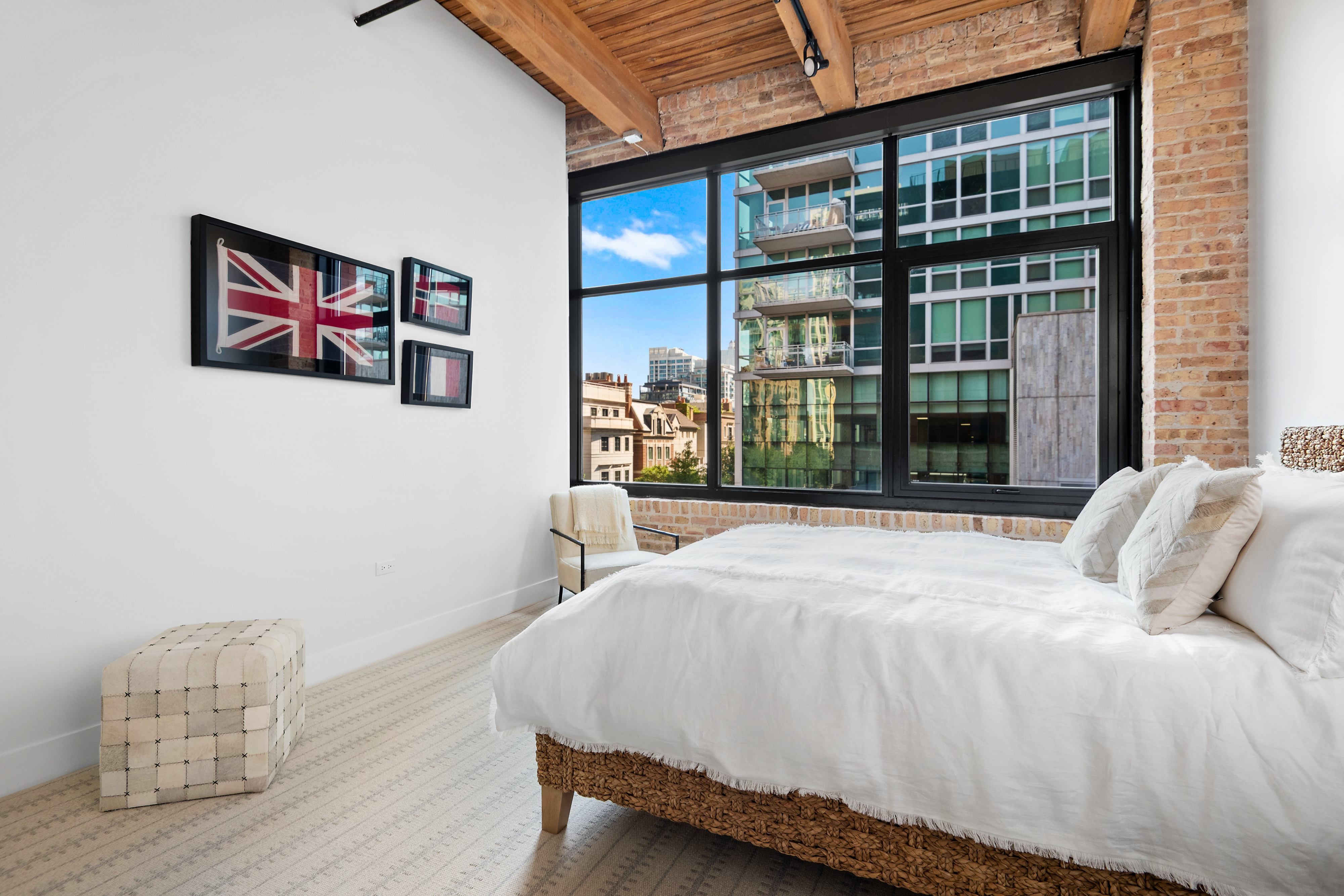 bedroom looking out to city skyline